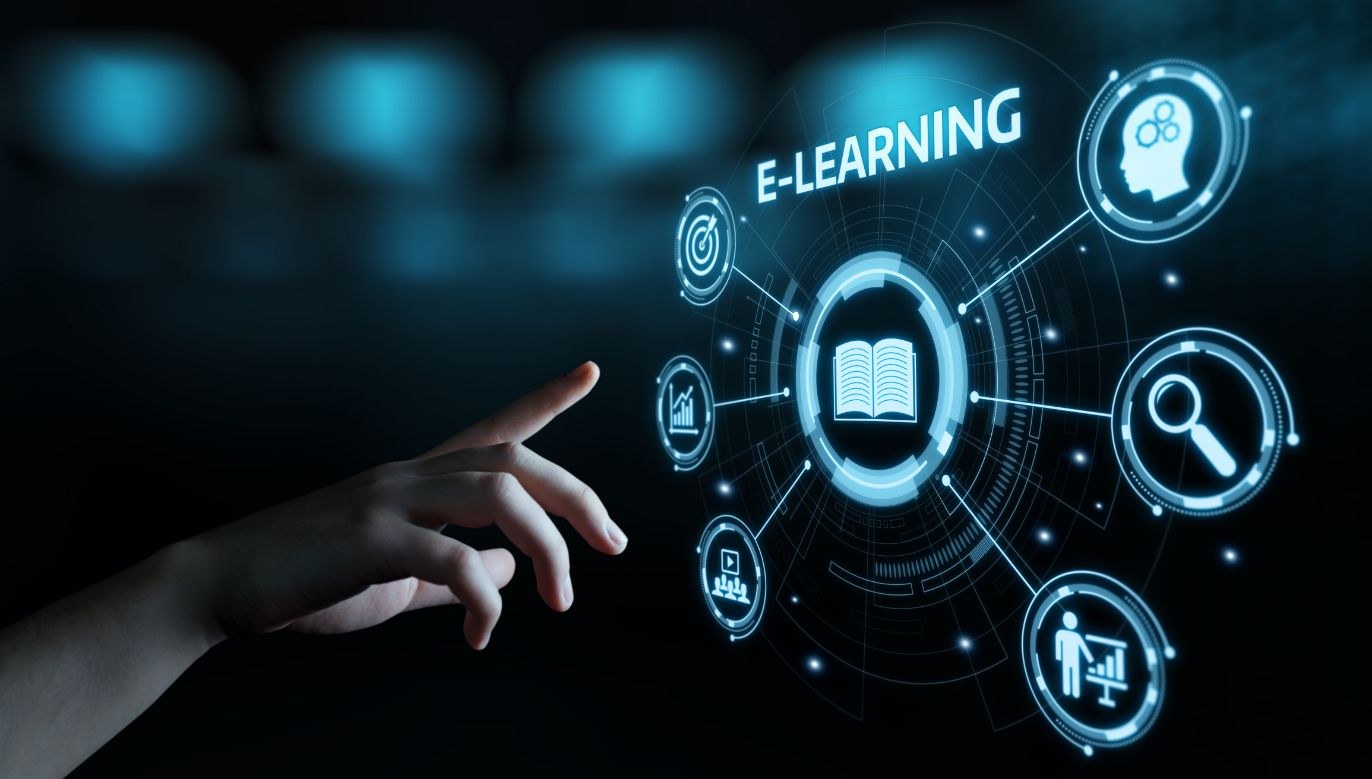 Hand touching an e-learning interface with connected icons