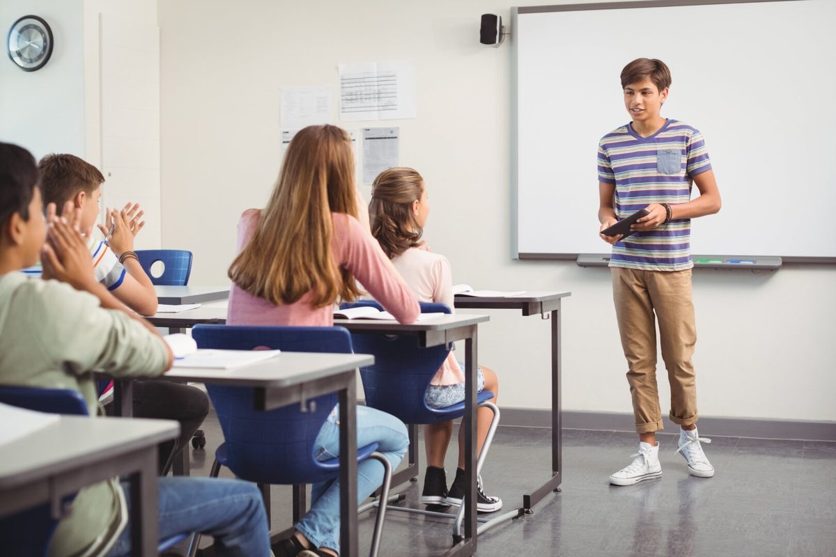 Student presenting to a classroom
